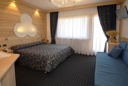 Hotel Flora Alpina Кампителло-ди-Фасса Экстерьер фото