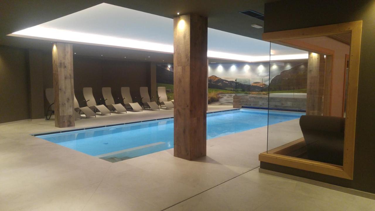Hotel Flora Alpina Кампителло-ди-Фасса Экстерьер фото